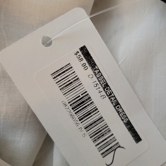 Chic Patterned Cross-Back Mini Dress - Picture 4 of 4